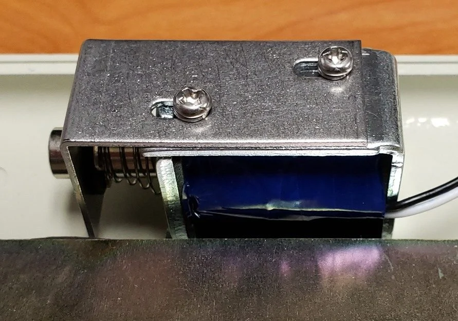 Model F Manual 57 Solenoid bracket at maximum throw position